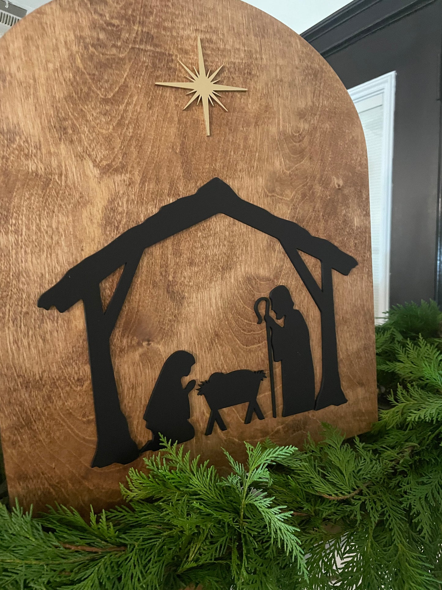 Arched nativity scene